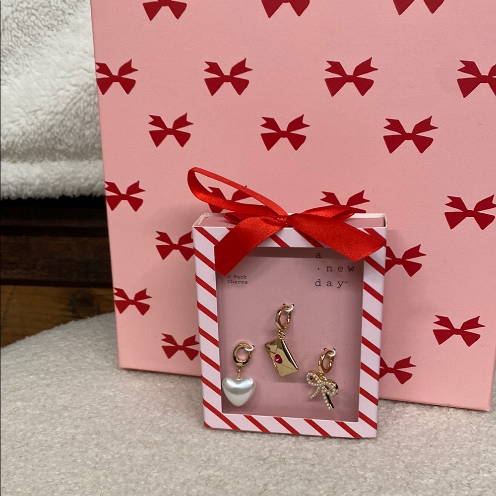 A New Day Charm Set with Red and White Details